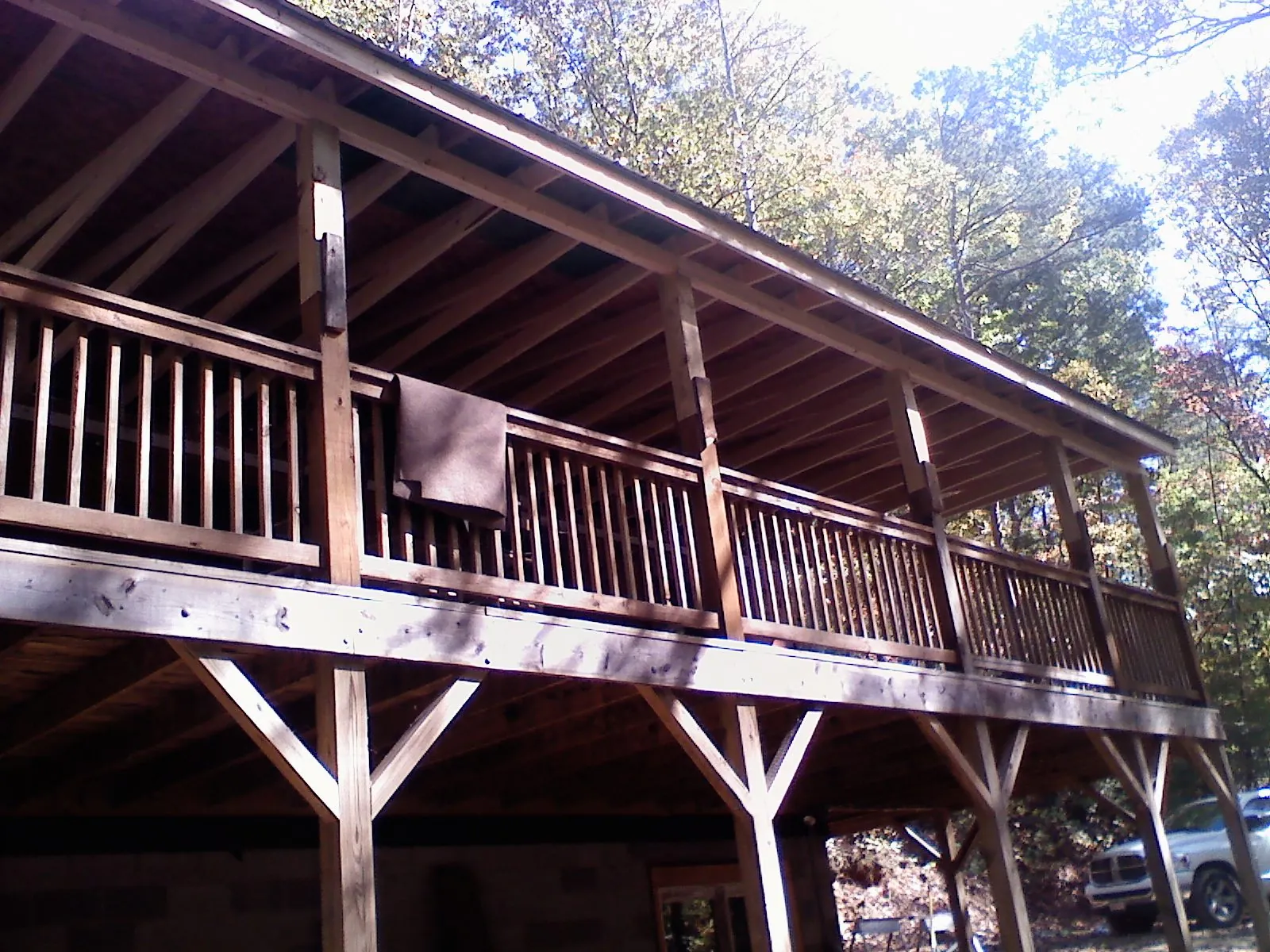 Timber framing under a new elevated porch and deck — Roof Leak Repair in Ennis by Roofing Brothers